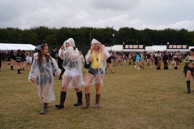 Fans battled adverse weather on Saturday, with heavy rain all afternoon