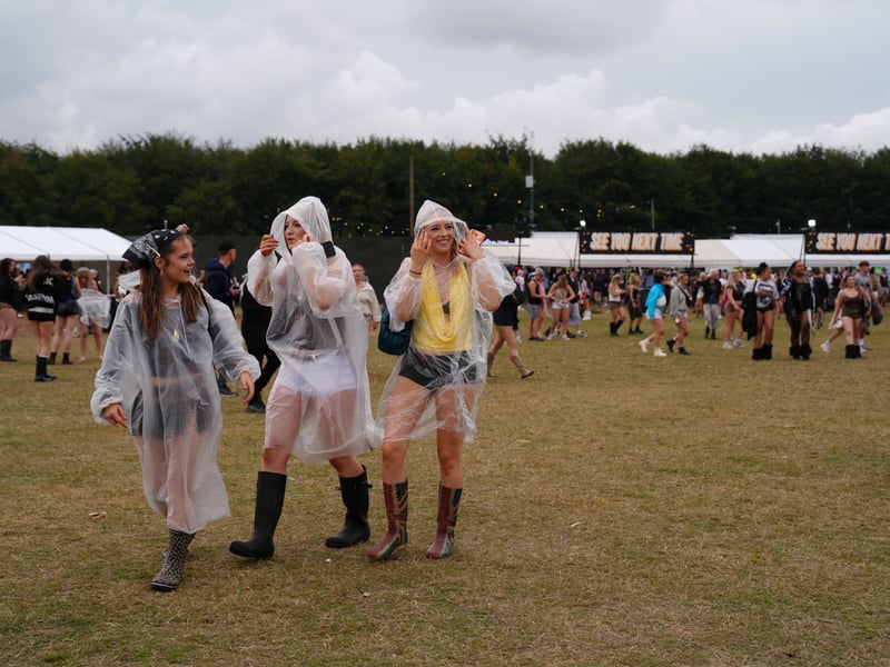 Fans battled adverse weather on Saturday, with heavy rain all afternoon