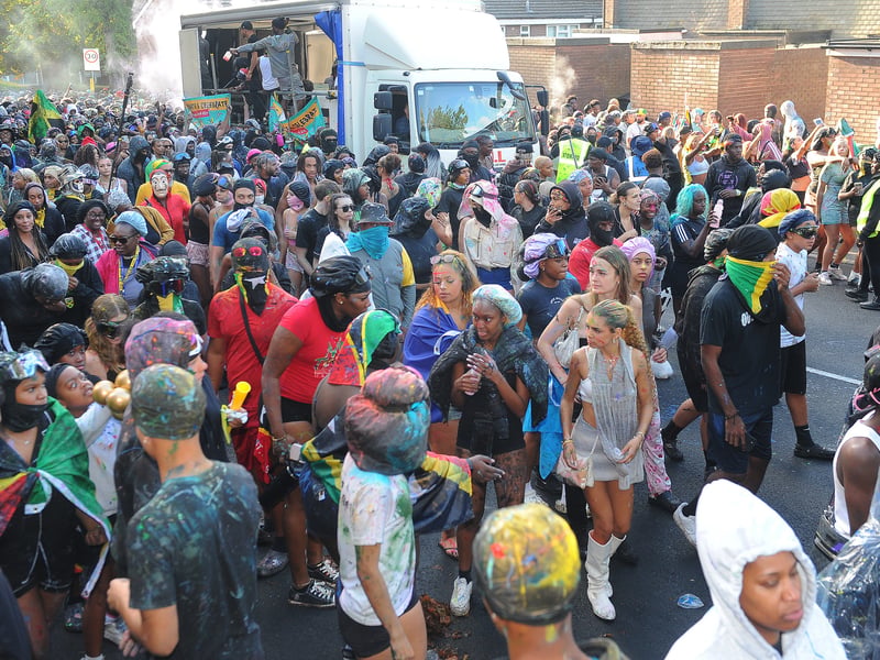 The early morning procession was an explosion of colour and joyful crowds