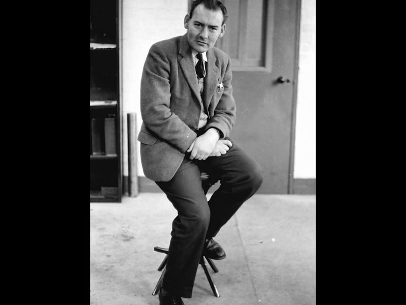 Same door in the background, same chair... It looks like Roy Harris had a photographic session when he invited his colleagues to have their pictures taken one by one for posterity.