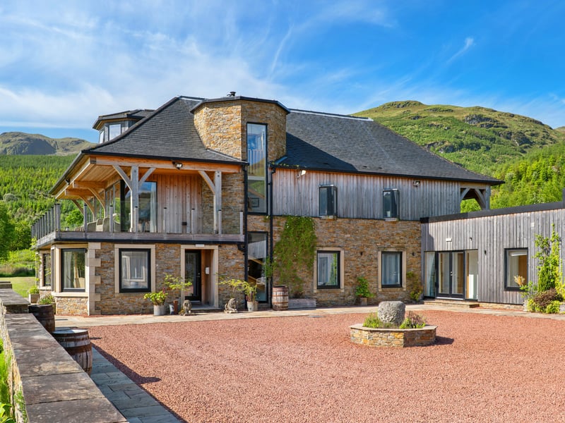 At the estate's heart is Carrick Castle Lodge and Annex, providing more than 7,500 sq ft of accommodation. Built in 2015 to the Scottish Gold Standard of Sustainability, the property has been designed to combine traditional materials, including stone, larch cladding and oak beams.
