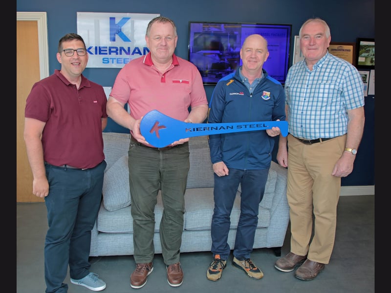 Longford GAA Treasurer Ciaran Walsh, Longford GAA Secretary Peter O'Reilly,  Longford GAA Chairperson Derek Fahy and Kiernan Steel founder Frank Kiernan with the 'Kiernan Steel' hurley used by comedian Mario Rosenstock at fundraiser