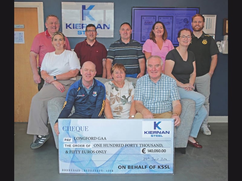 Pictured at the presentation of the fundraiser cheque were (standing) Longford GAA Secretary Peter O'Reilly, Longford GAA Treasurer Ciaran Walsh, John Kiernan (Head Engineer Kiernan Steel), Martina Brady (HR / Payroll Manager Kiernan Steel) and Paddy Kiernan (Junior Project Manager). Seated: Amy Faughnan (Buyer Kiernan Steel), Longford GAA Chairperson Derek Fahy, Amy Faughnan, founders of Kiernan Steel Dolores and Frank Kiernan, and Maree Glancy (Accountant Kiernan Steel)  
