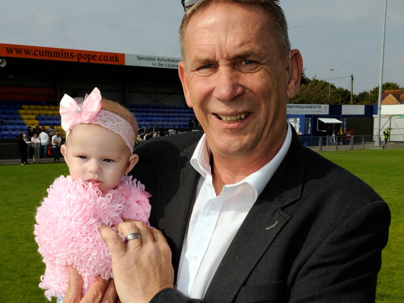 Alan Knight at a  charity football match at The Havant and Waterlooville ground to raise funds for One upon a Smile and Children with Cancer, 2015. It was Pompey Legends v The TV Stars which included several actors from popular TV soap programmes. Alan is pictured with his granddaughter Amelia-May Wingate
Picture by:  Malcolm Wells (151004-6127)