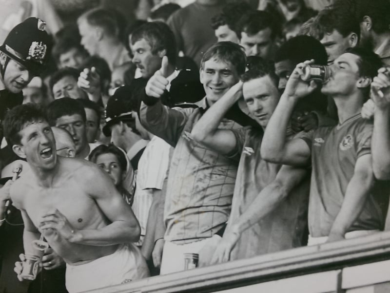 Pompey's 1986-87 division two winning team celebrate their success. Left to right: Paul Marriner, Alan Knight, Kevin O'Callaghan, Vince Hilaire and Mick Kennedy.