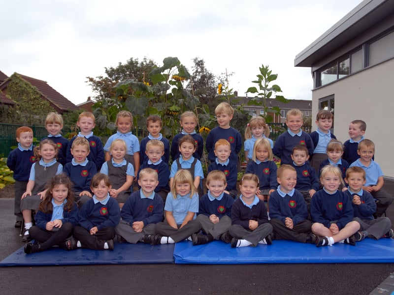 St Oswald's Catholic Primary gets our attention and look how many excited pupils lined up for this fantastic photo.