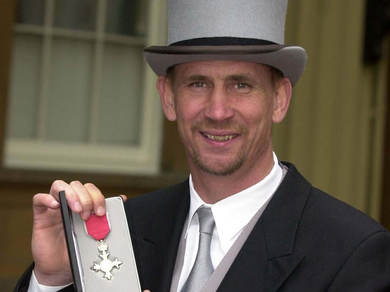 Alan Knight with his MBE at the Palace