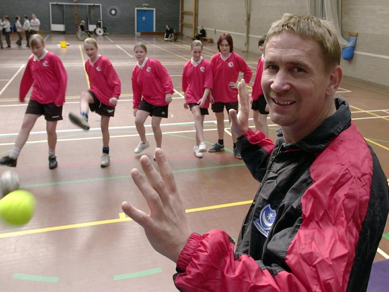 In the line of fire! Alan Knight faces the football team of the Portsmouth School for Girls in a charity shot out.