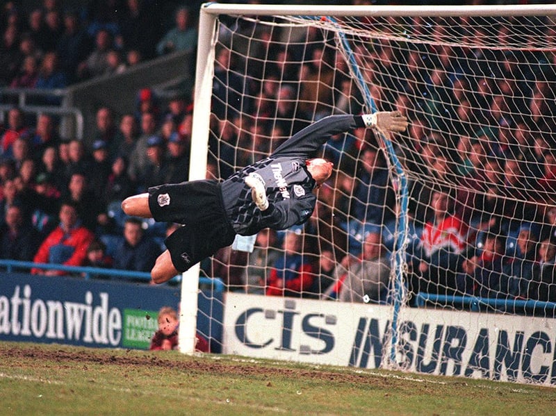 Alan Knight covers a Crystal Palace shot on goal