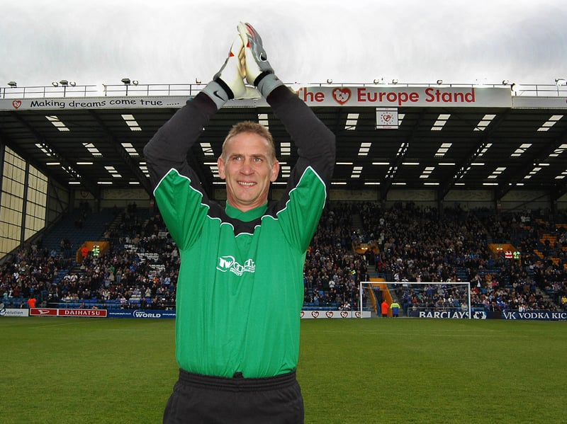 Alan Knight salutes the crowd at his testimonial game.
Picture Mick Young