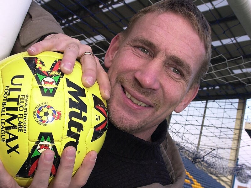 Alan Knight pictured in 2000 after he was made an MBE in the New Year honours list