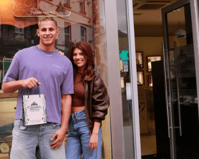 Fitzy and Lola outside the jewellers