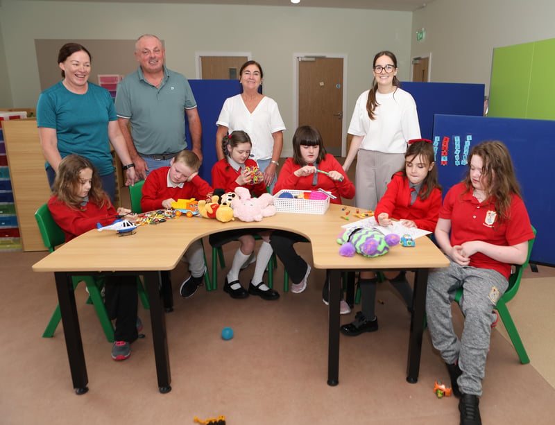 Alice, Ben, Georgia, Madison, Sienna and Jessie enjoying playtime at their new classroom in Scoil Íosagáin.  Also in the photograph is Sandra Whoriskey, Mark Crossan, Anne McDaid and teacher Claire Doherty