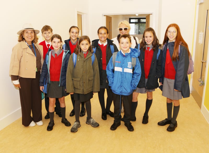 Paola Mahon and Patricia Doherty with the Spanish students who will spend their first term in the new Scoil Íosagáin