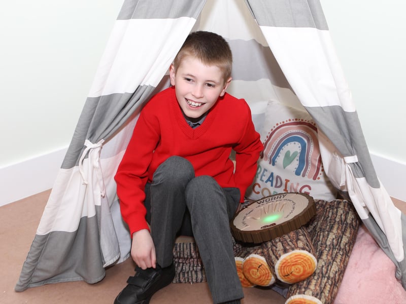 Oran McFeeley enjoying the tepee in his new classroom