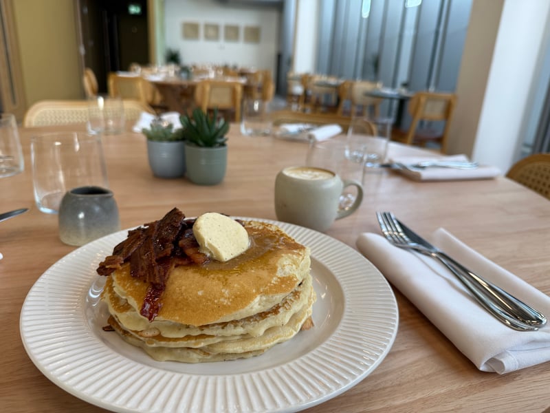 House specialities include pancake stack (£13.50), French toast (£13.50), waffles (£14.50), duck and waffles (£18), foul medames (£14) and more.