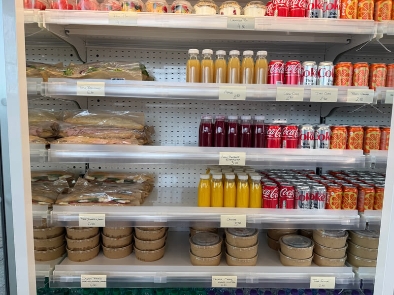 There's a range of grab and go options, including fresh juices (£3.50), a range of salads including chicken satay and smashed cucumber (£6.50) and baguette sandwiches including brie, tomato and basil (£6.50).