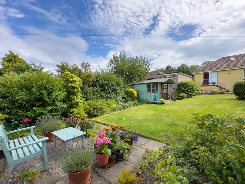 Externally, the property boasts private front and rear gardens.