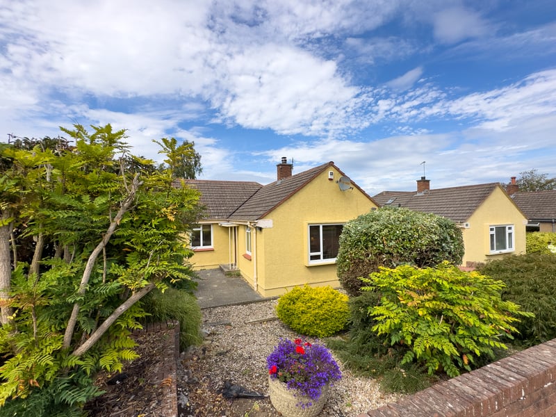 This is a desirable three-bedroom semi-detached bungalow with private gardens, driveway and a garage.