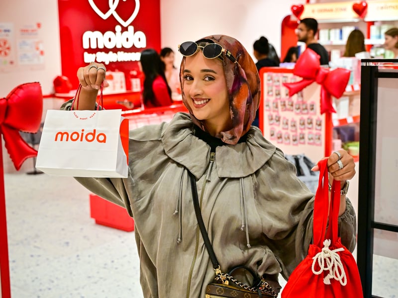 A happy customer at Moida's opening