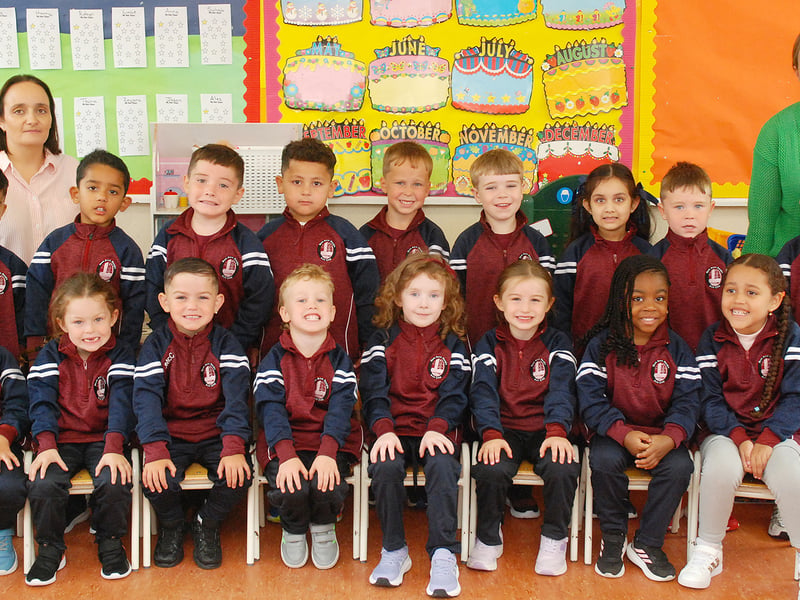 Pictured on their first day at school are the Junior Infants Class of Scoil Eoin Naofa National School 2026 with Teachers Martina Carroll and Maria Feehan. Photo: PJ Wright