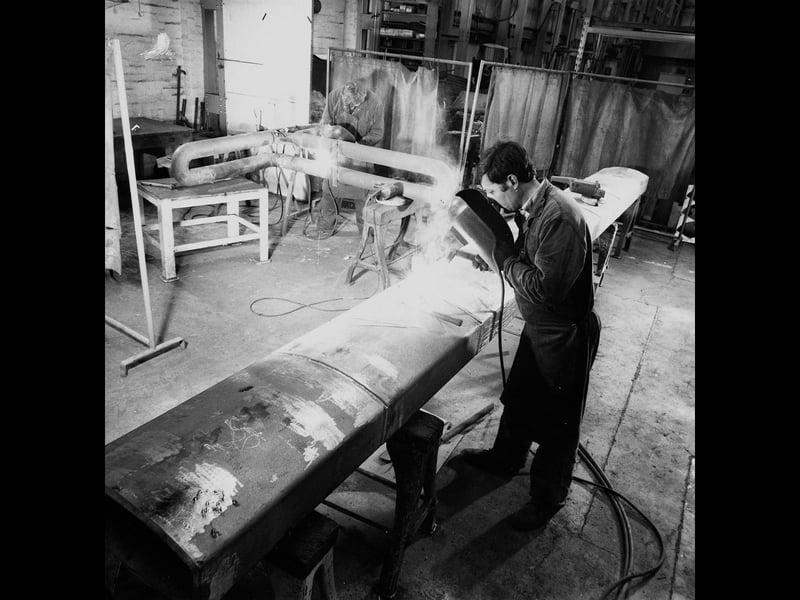 Workers at Ecotherm Furnaces in Great Bridge, Tipton, are pictured welding nickel-chrome sections of a new sintering muffle furnace in April 1984. The company had moved from Redditch to a much larger 70,000 sq ft factory, using 30,000 sq ft for its own operations and creating an extra 25 local jobs. Started by husband and wife Melvin and Louise Wheeler just six years earlier, Ecotherm had grown from a tiny 250 sq ft unit to a company employing almost 50 people. Do you remember Ecotherm Furnaces or the factory at Great Bridge? Did you or someone you know work there during the 1980s?