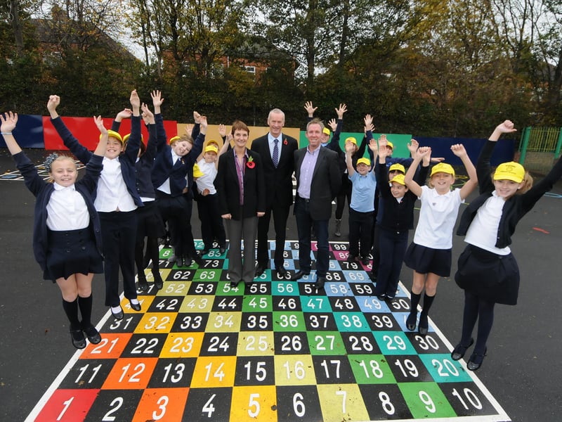 We're loving the colourful new playground markings which were created at Mortimer Primary School 15 years ago.
The pupils adored them and they were joined by deputy head Pam Appleby, head Geoff Seagrove and business man Graeme Foreman.