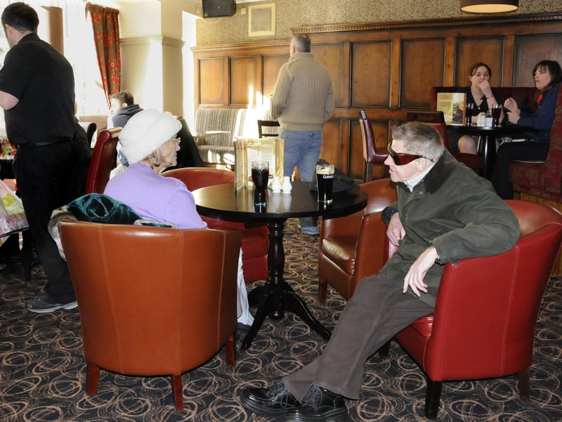 A busy day with lots of customers enjoying the cosy atmosphere in the pub 13 years ago.