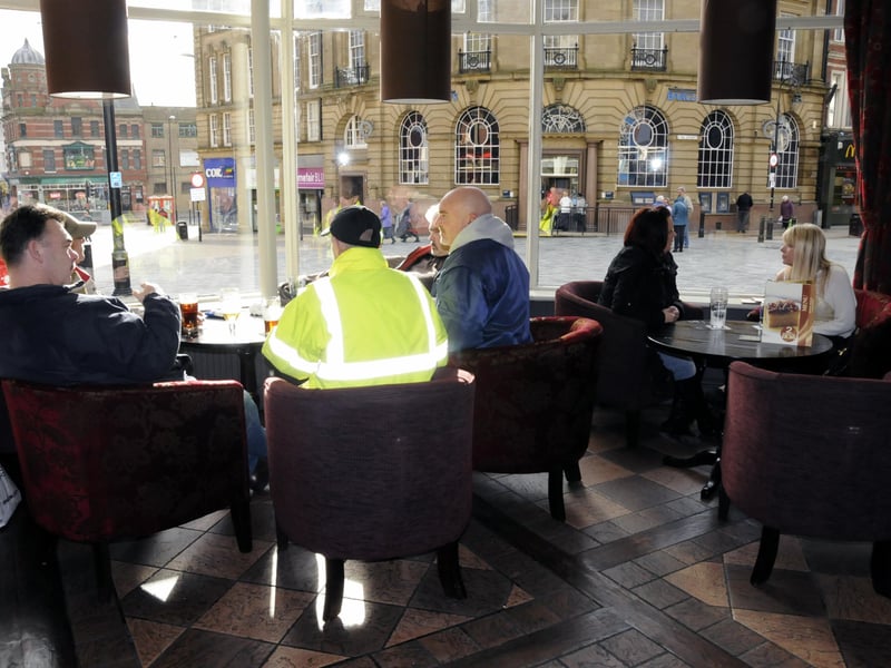 A window view for these customers as they relax with refreshments in the pub 13 years ago.