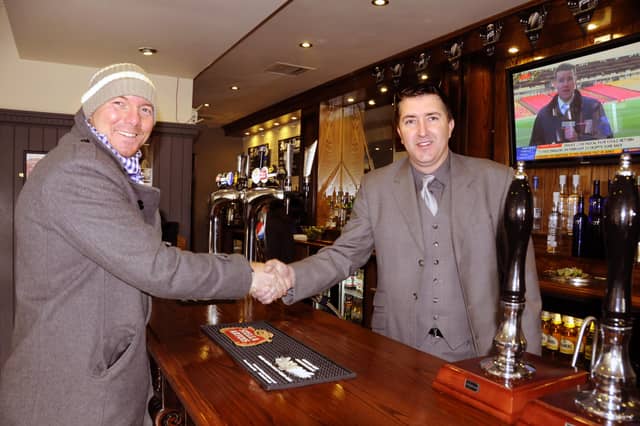 Manager Stan Mckeith was pictured as he greeted one of his regular customers in a scene from February 2013.
