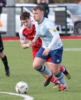 Colin Kelly of Salthill Devon and Oisin Duffy of Colga in an FAI Junior Cup clash between the sides in Kilcornan last season.