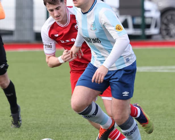Colin Kelly of Salthill Devon and Oisin Duffy of Colga in an FAI Junior Cup clash between the sides in Kilcornan last season.