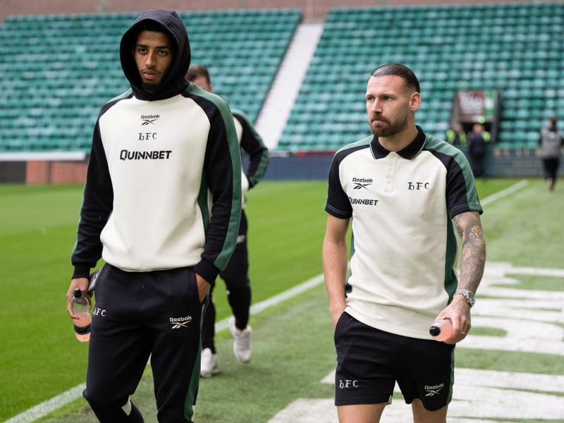 Hibernian's Azeem Abdulai (L) and Martin Boyle arrive 