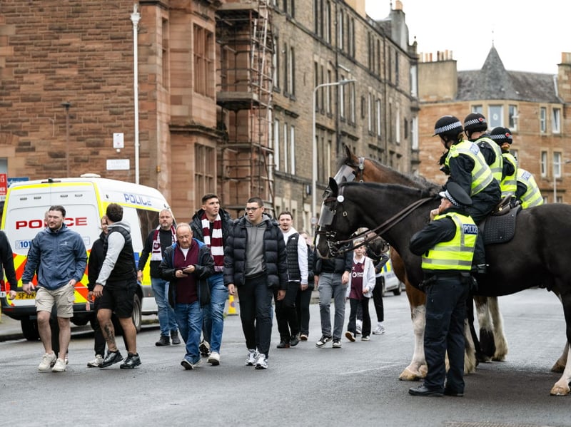  Hearts fans arrive at the stadium before a William Hill Premiership match between Hibernian and Heart of Midlothian