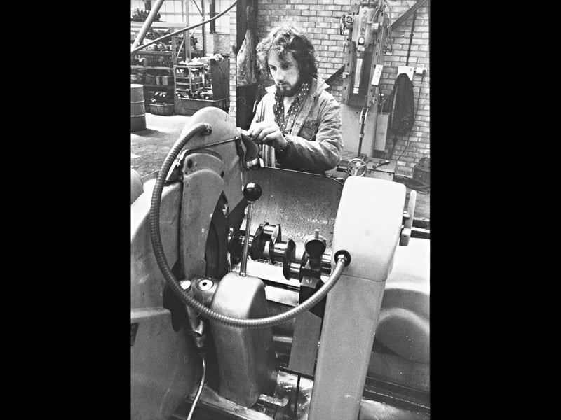 A machinist is pictured working on an engine crankshaft at Power Train Engineering in Stringes Close, Willenhall, in June 1980. He is using specialist balancing equipment to check and adjust the crankshaft, where precision was essential to ensure engines performed correctly. The photograph offers a glimpse inside a busy Black Country engineering workshop, where skilled manual work and specialist machinery came together to produce and recondition high-specification engine components. Do you remember Power Train Engineering or its Stringes Close works? Did you or someone in your family work in Willenhall’s engineering industry during the 1980s?