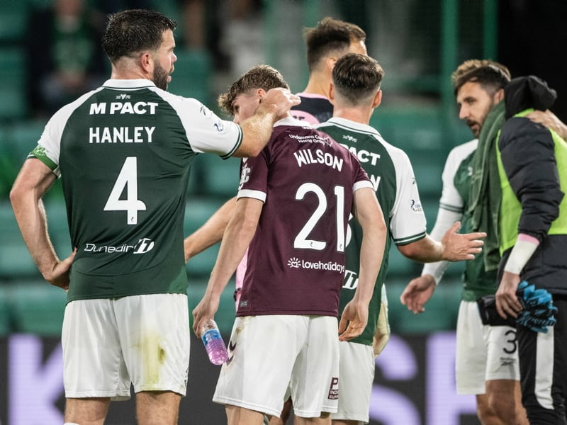 Hibernian's Grant Hanley (L) and Hearts' James Wilson at full time 
