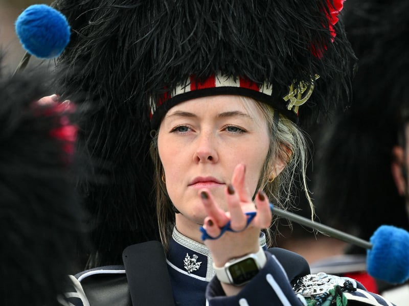 A drummer parades with the massed pipe during the annual Braemar Gathering in Braemar