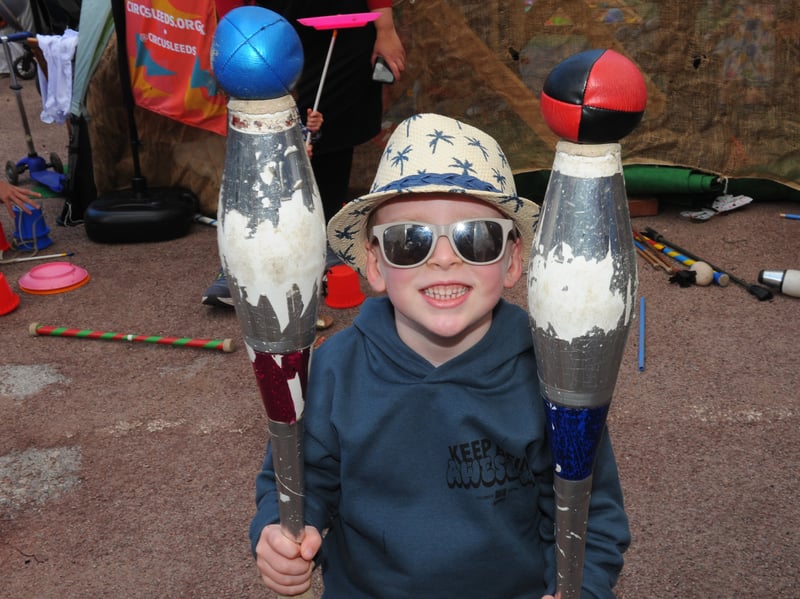 Jake, five, balancing the balls.