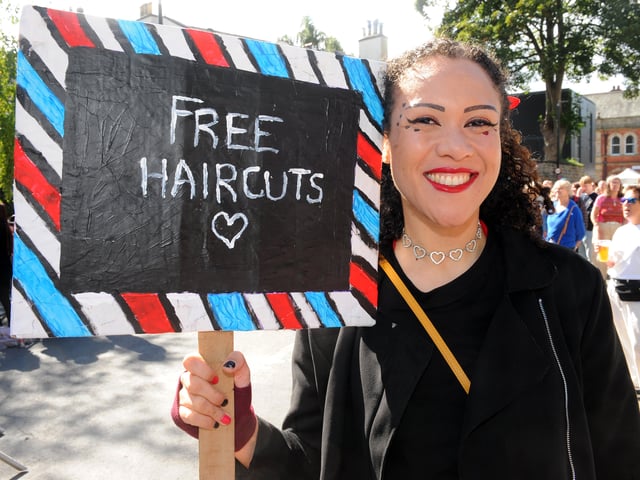 Apprentice barber Josie Breen of Butler's Barbering, Chapel Allerton was giving away free haircuts at the festival.