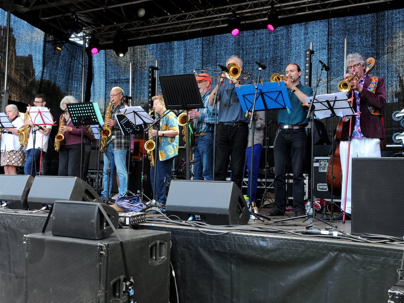 Local community band Instant World Orchestra on stage at the festival.