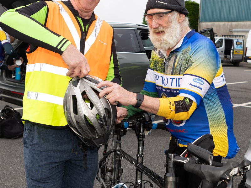 Seamus Buckley, Tullamore helping out Billy Shanahan with his helmet before setting off on the Pedal the Peaks Pat Colgan Challenge. 