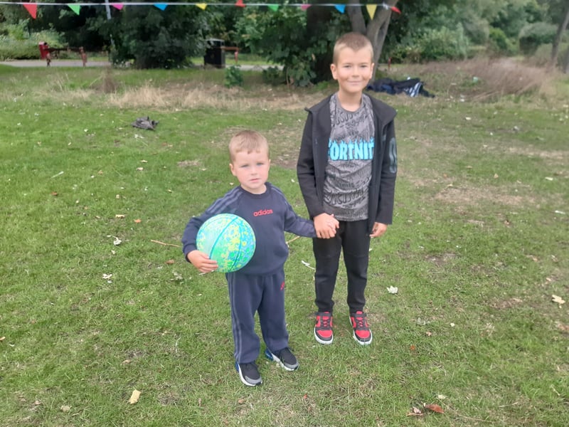 These two brothers enjoyed a kick-about with a football.