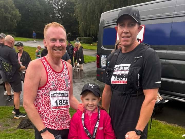 Three happy runners after the race