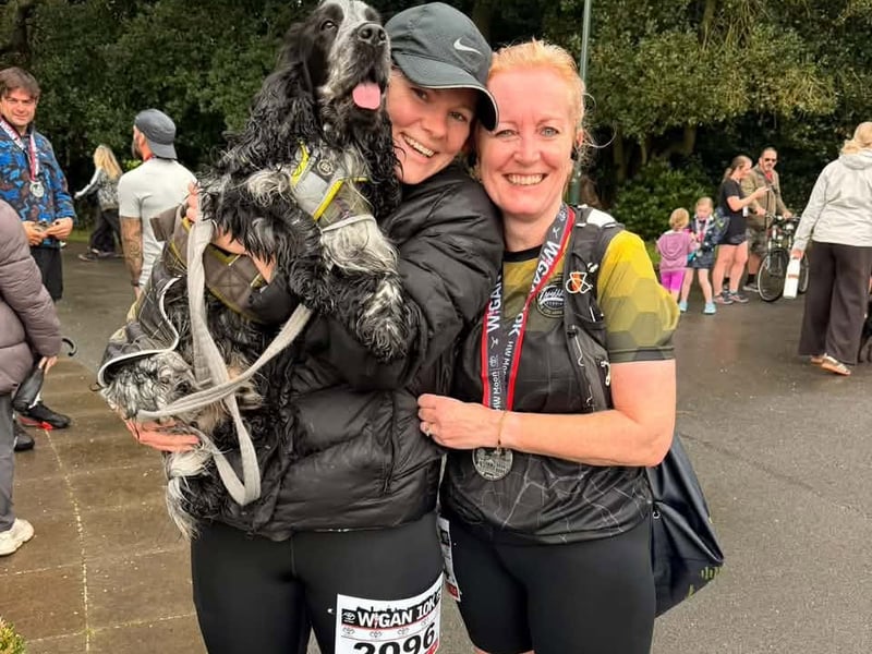 Two runners with their perfect pooch