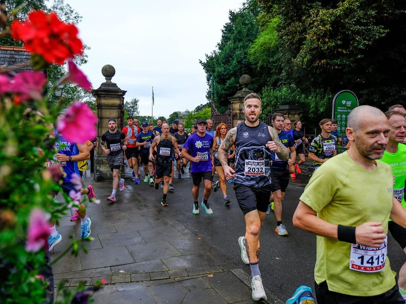 A runner sticks his tongue out for the camera