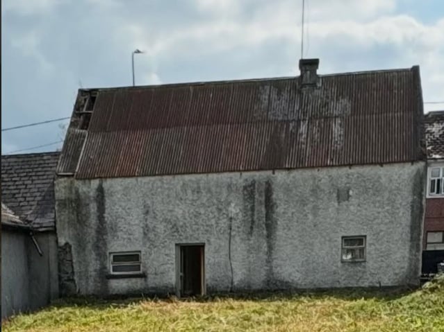 A view of the rear of the house, before work was done.