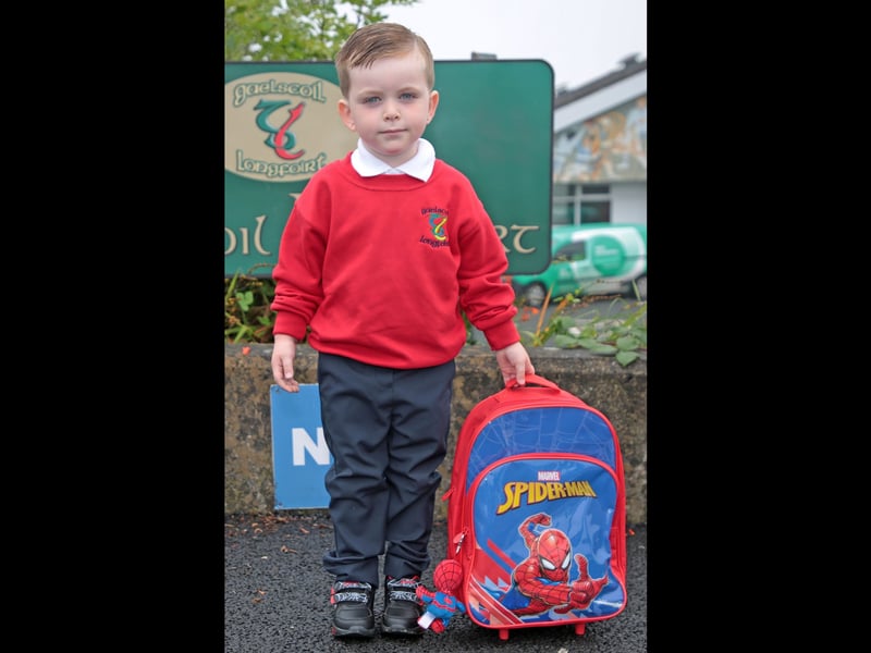 Patrick McDonagh stands proudly in his Gaelscoil Longfoirt uniform along with his Spiderman schoolbag