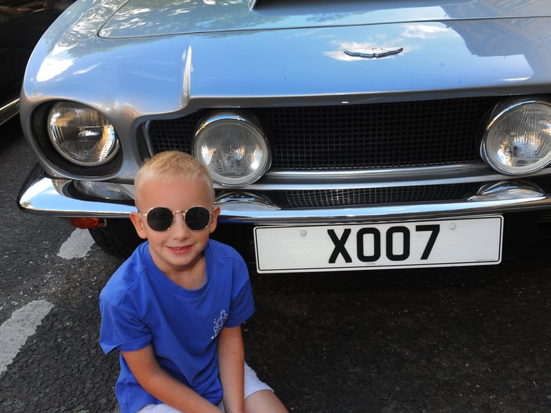 Five-year-old Seb Bedford finds a Aston Martin with a James Bond number plate.