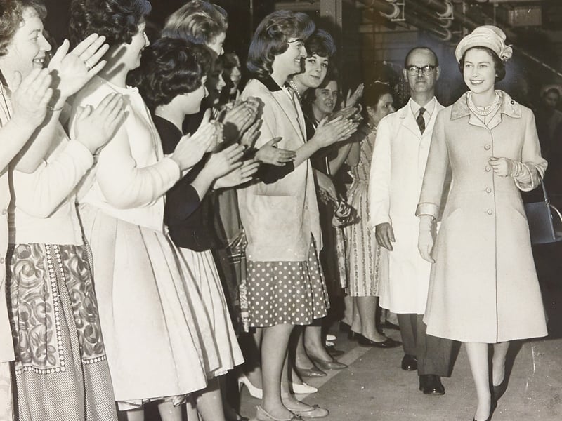 Delighted workers line the factory floor, clapping enthusiastically as Her Majesty Queen Elizabeth II tours the J A Crabtree & Co. electrical works in Walsall in May 1962. Dressed elegantly in a light coat and matching hat, the monarch smiled as she walked through the Lincoln Works, observing the skilled workforce manufacturing electrical accessories and switchgear. As one of the town’s major employers, the Crabtree factory visit was a monumental highlight of the Queen's tour across the Black Country and Staffordshire. Were you or any of your family working at Crabtree's when the Queen walked through the factory in May 1962?