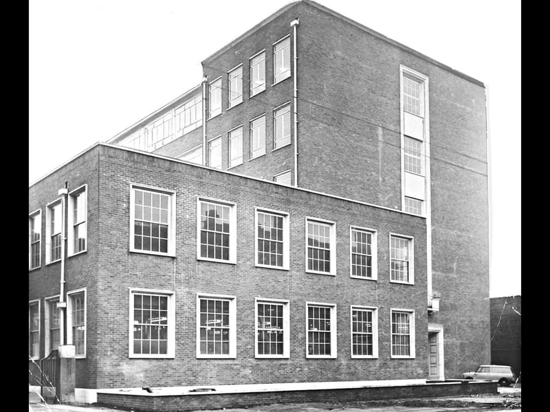 Captured in December 1962, the impressive new facilities for the Building and Civil Engineering department stand ready at the Wolverhampton and Staffordshire College of Technology. Rising behind a modern two-storey block housing specialised workshops, the main five-storey building marked the completion of the fifth major phase in the college's post-war redevelopment scheme. The modern expansion provided cutting-edge lecture rooms and practical labs to train the next generation of engineers, builders, and technicians across the region. Did you study trade skills or attend classes at the College of Technology back in the 1960s?
